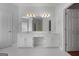 Bright bathroom with double vanity, large mirror, and updated fixtures at 210 Sweetwater Dr, Fayetteville, GA 30214