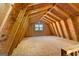 Unfinished outbuilding interior with window and stairwell at 210 Sweetwater Dr, Fayetteville, GA 30214