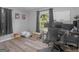 Bedroom converted to office, with wood-look flooring, neutral walls, dual monitors, and natural light at 2903 Monterey Dr, Decatur, GA 30032