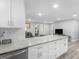 Bright, open-concept kitchen with granite counters and stainless steel appliances at 2903 Monterey Dr, Decatur, GA 30032