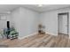 Cozy living room features wood-look floors, neutral paint, and recessed lighting at 2903 Monterey Dr, Decatur, GA 30032