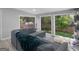 Relaxing living room with a comfortable sectional sofa and serene backyard views at 2903 Monterey Dr, Decatur, GA 30032