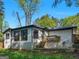 Back exterior featuring a wooden deck and a backyard at 2903 Monterey Dr, Decatur, GA 30032
