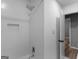 Modern shower area with white subway tile, built in niche, and rain style shower head at 2903 Monterey Dr, Decatur, GA 30032