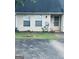 Charming townhome exterior with light siding, well-maintained lawn, and inviting front door at 6183 Field Stone Dr, Douglasville, GA 30134