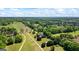 Aerial view of home on manicured, large lot at 2060 Dixie Rd, Covington, GA 30014