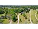 Expansive property featuring a well-maintained home, lush greenery, long driveways, and a refreshing swimming pool at 2060 Dixie Rd, Covington, GA 30014