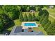 This home is equipped with an inground swimming pool and large shed at 2060 Dixie Rd, Covington, GA 30014