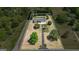 Stunning aerial perspective of the property, highlighting its expansive yard and peaceful setting at 424 N Green Cir, Mcdonough, GA 30252