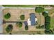 Overhead shot displays mature landscaping and a private backyard with a fence at 424 N Green Cir, Mcdonough, GA 30252