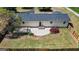 Aerial view of the home's backyard and patio space, enclosed by a wood fence at 424 N Green Cir, Mcdonough, GA 30252
