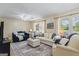 Comfortable living room with plush seating, natural light, and a cozy ambiance, perfect for Gathering gatherings and relaxation at 424 N Green Cir, Mcdonough, GA 30252