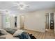 Spacious main bedroom with hardwood floors, neutral color palette, and access to a walk-in closet and ensuite bathroom at 424 N Green Cir, Mcdonough, GA 30252