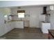 Bright kitchen featuring white cabinets, butcher block countertops, stainless range hood, and subway tile backsplash at 2338 Rambling Way, Lithonia, GA 30058