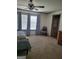 Spacious bedroom with natural light, plush carpeting, and stylish decor at 6127 Floyd Ne St, Covington, GA 30014