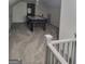 Upstairs game room featuring an air hockey table and neutral carpet flooring at 6127 Floyd Ne St, Covington, GA 30014