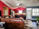 Open-concept living space seamlessly connects the living room to the modern kitchen at 1598 Renaissance Ne Dr, Conyers, GA 30012
