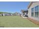 Large backyard featuring a patio, grill, and soccer net, creating a versatile space for outdoor entertainment and activities at 609 Francis Ave, Peachtree City, GA 30269
