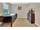 Bedroom with wooden bed, a small entertainment center, and bright natural light at 609 Francis Ave, Peachtree City, GA 30269