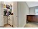 Walk-in closet with shelving and hanging space, connected to a bedroom at 609 Francis Ave, Peachtree City, GA 30269