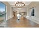 Charming dining room with an open concept layout and rustic table, leading into the modern kitchen at 609 Francis Ave, Peachtree City, GA 30269
