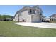 Well-maintained home with a basketball hoop, two car garage, and a neatly kept lawn at 609 Francis Ave, Peachtree City, GA 30269