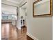 Elegant foyer with hardwood flooring that leads to the kitchen and living areas at 609 Francis Ave, Peachtree City, GA 30269