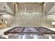 Close up of cooktop and backsplash in modern kitchen with stainless steel appliances at 609 Francis Ave, Peachtree City, GA 30269