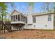 Rear exterior of home featuring a deck and screened-in porch at 149 Camden Woods Pl, Dallas, GA 30157