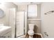 Bathroom featuring a glass-enclosed shower, toilet, and a vanity with sink at 149 Camden Woods Pl, Dallas, GA 30157
