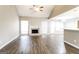 Spacious living room features a fireplace, vaulted ceilings and sleek hardwood flooring, perfect for gatherings at 149 Camden Woods Pl, Dallas, GA 30157