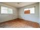 Empty room with hardwood floors and windows, ready for a new look at 2595 Bonnybrook Sw Dr, Atlanta, GA 30311