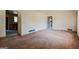 View of an open-concept living room and potential kitchen area at 2595 Bonnybrook Sw Dr, Atlanta, GA 30311