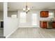 Cozy dining area features modern lighting, new floors and a view to the backyard at 3675 Arminto Dr, Ellenwood, GA 30294