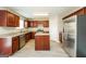 Beautiful kitchen features stainless steel appliances, granite countertops and a central island at 3675 Arminto Dr, Ellenwood, GA 30294
