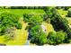 Aerial view of a home surrounded by lush greenery and a well-defined property line at 20 Rosser Rd, Mcdonough, GA 30252