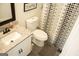 Stylish bathroom featuring updated vanity, decorative mirror and accents, and modern shower, creating a cozy vibe at 20 Rosser Rd, Mcdonough, GA 30252