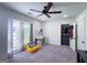 Large bedroom featuring carpet, natural light, a beanbag chair, and closet, creating a welcoming and flexible space at 20 Rosser Rd, Mcdonough, GA 30252