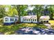 Charming home featuring a spacious backyard, perfect for entertaining and outdoor activities at 20 Rosser Rd, Mcdonough, GA 30252