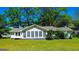 A beautiful home with plenty of windows sits on a verdant lot, featuring a well-maintained exterior and established landscaping at 20 Rosser Rd, Mcdonough, GA 30252