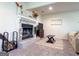 Close-up of the living room fireplace highlighting its mantel, tile work, and decorative elements at 20 Rosser Rd, Mcdonough, GA 30252