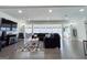 Spacious living room with hardwood floors, recessed lighting, and a modern design at 20 Rosser Rd, Mcdonough, GA 30252