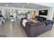 Open floor plan showcasing the living room with hardwood floors, comfortable seating, and access to the kitchen at 20 Rosser Rd, Mcdonough, GA 30252