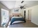 Bedroom with large window seat, vaulted ceiling, and ceiling fan at 20 Rosser Rd, Mcdonough, GA 30252