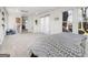 Spacious bedroom with large windows, comfortable furnishings, and neutral decor at 20 Rosser Rd, Mcdonough, GA 30252