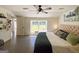 Spacious main bedroom boasts hardwood floors, natural light, and an adjacent closet, promoting a clean and airy feel at 20 Rosser Rd, Mcdonough, GA 30252