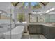 Modern bathroom with a soaking tub and a large window providing natural light at 40 Butler Bridge Dr, Mcdonough, GA 30252