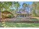 Charming single-Gathering home featuring a covered porch and a detached pavilion, perfect for outdoor entertaining at 40 Butler Bridge Dr, Mcdonough, GA 30252
