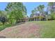 Scenic view of the house and its pavilion featuring mature trees and a spacious yard at 40 Butler Bridge Dr, Mcdonough, GA 30252
