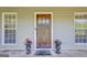 View of the wooden front door at 40 Butler Bridge Dr, Mcdonough, GA 30252
